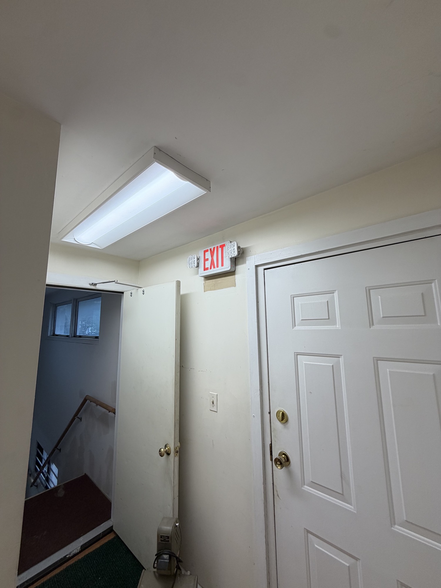 Wraparound light and exit sign