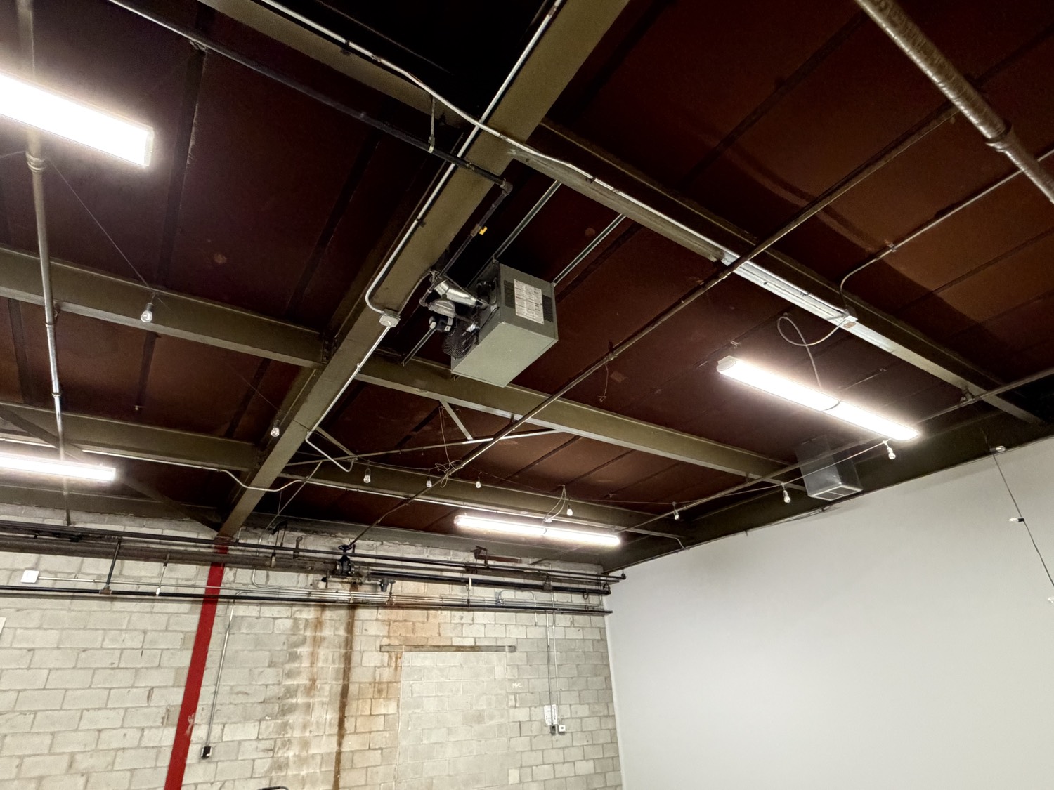 Strip lights on a steel ceiling